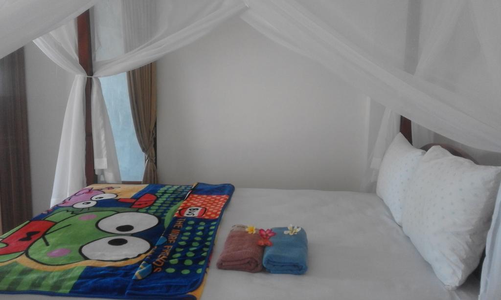 Sudi Homestay Amed Esterno foto